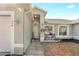 Inviting front entry with a welcome sign, chairs, and a charming front door at 154 Desiree Aurora St, Winter Garden, FL 34787