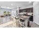 Beautiful kitchen with granite countertop island, stainless steel appliances, and seating at 16390 Blooming Cherry Dr, Groveland, FL 34736