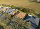 Aerial view of property showcasing the roof, surrounding trees and landscaping, and property lines at 182 Crepe Myrtle Dr, Groveland, FL 34736