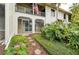 Exterior view of a condo, a screened lanai and landscaping at 200 Maitland Ave # 131, Altamonte Springs, FL 32701