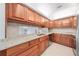 Updated kitchen with granite countertops, cabinetry, and stainless steel appliances at 200 Maitland Ave # 131, Altamonte Springs, FL 32701