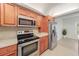 Well-equipped kitchen featuring granite countertops, stainless steel appliances, and ample cabinet space at 200 Maitland Ave # 131, Altamonte Springs, FL 32701
