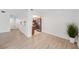 Bright and airy living room with modern flooring and open sightlines to the kitchen at 200 Maitland Ave # 131, Altamonte Springs, FL 32701