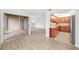 Bright living room with smooth flooring and a seamless transition to the lanai and kitchen at 200 Maitland Ave # 131, Altamonte Springs, FL 32701