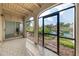 Screened-in patio featuring tile floor and view of a lake at 200 Maitland Ave # 131, Altamonte Springs, FL 32701