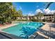 Large community pool with blue water and lots of lounge seating at 200 Maitland Ave # 131, Altamonte Springs, FL 32701