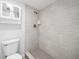 Tiled shower and toilet, plus a mirrored cabinet at 200 Maitland Ave # 131, Altamonte Springs, FL 32701