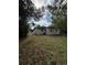 Wide angle view of the side and rear of the house showing the yard at 2426 Barbarossa Ave, Deltona, FL 32738