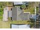 Aerial view of the home showing the roof and deck in the backyard at 2439 Lake Jackson Cir, Apopka, FL 32703