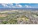 An aerial view showcases the secluded property surrounded by Florida's natural landscape at 255 Butterfly Forest Rd, Geneva, FL 32732