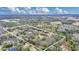 Aerial view of property boundaries showcasing the surrounding landscape and wooded areas at 255 Butterfly Forest Rd, Geneva, FL 32732