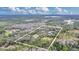 Expansive aerial view of the property, showcasing its vast acreage with mature trees at 255 Butterfly Forest Rd, Geneva, FL 32732