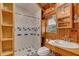 Charming bathroom features a tiled shower, wooden accents, and a stylish sink at 255 Butterfly Forest Rd, Geneva, FL 32732