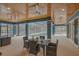 Covered lanai offers an outdoor dining area and a beautiful view of the pool at 255 Butterfly Forest Rd, Geneva, FL 32732