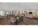 Expansive living area featuring a pool table, dining, and kitchen at 255 Butterfly Forest Rd, Geneva, FL 32732
