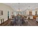 Spacious open-concept living room with dining area and modern finishes at 255 Butterfly Forest Rd, Geneva, FL 32732