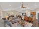 Bright, open-concept living area flows seamlessly into the kitchen and dining area at 255 Butterfly Forest Rd, Geneva, FL 32732