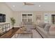 Comfortable living room with hardwood floors and ample natural light at 255 Butterfly Forest Rd, Geneva, FL 32732