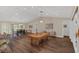 Spacious living area with pool table, dining, and easy access to bathroom at 255 Butterfly Forest Rd, Geneva, FL 32732