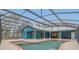Spacious pool area with covered lanai and plenty of room for outdoor enjoyment at 255 Butterfly Forest Rd, Geneva, FL 32732