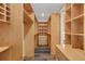 Large walk-in closet with custom shelving and plenty of storage space at 255 Butterfly Forest Rd, Geneva, FL 32732