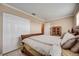 Bedroom with tiled floors and a large closet provide ample storage space at 290 Orange Ave, St Cloud, FL 34769