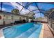The screen-enclosed pool area offers a private, refreshing retreat perfect for outdoor enjoyment at 290 Orange Ave, St Cloud, FL 34769