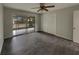 Spacious bedroom with sliding door access to screened lanai and features a large closet and modern ceiling fan at 38 Emerald Ct, Ocala, FL 34472
