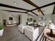 Bright and airy living room featuring vaulted ceilings and modern furnishings at 38 Emerald Ct, Ocala, FL 34472