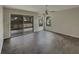 Primary bedroom with large sliding glass doors to the screened in porch with multiple windows for natural light at 38 Emerald Ct, Ocala, FL 34472