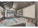 Unique bunk bed with fish-themed bedding, a slide, and custom railing details at 3811 Lana Ave, Davenport, FL 33897