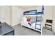 room with blue and white bunk beds with white and colorful pillows at 3811 Lana Ave, Davenport, FL 33897