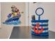 Close up of a blue and white basket with a nautical anchor design in a room at 3811 Lana Ave, Davenport, FL 33897