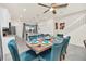 Dining area features seating for six, modern decor and flows into the kitchen at 3811 Lana Ave, Davenport, FL 33897