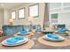 Dining area with table set for six, light from windows and recessed lighting at 3811 Lana Ave, Davenport, FL 33897