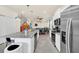 Modern kitchen with stainless appliances, granite countertops and open plan design at 3811 Lana Ave, Davenport, FL 33897