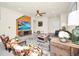 Bright living room with modern decor, a large TV, comfortable seating, and an open layout at 3811 Lana Ave, Davenport, FL 33897