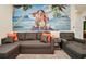 Comfortable seating area with a sofa, accent chair, and stylish decor at 3811 Lana Ave, Davenport, FL 33897
