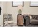 Cozy living room details with stylish lamp, side table and luxurious leather sofa at 3811 Lana Ave, Davenport, FL 33897