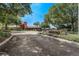 A beautiful clubhouse surrounded by lush greenery, showcasing the community's inviting atmosphere at 3995 Sw 57Th Ct, Ocala, FL 34474