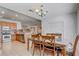 Dining area blending seamlessly into the kitchen and living spaces, offering an inviting atmosphere for gatherings at 3995 Sw 57Th Ct, Ocala, FL 34474
