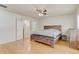 Spacious main bedroom with hardwood floors and ensuite bathroom entrance at 3995 Sw 57Th Ct, Ocala, FL 34474