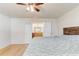 Bright main bedroom featuring an en suite bathroom and hardwood floors at 3995 Sw 57Th Ct, Ocala, FL 34474