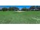 Community sand volleyball court surrounded by lush green grass, inviting residents for friendly games at 3995 Sw 57Th Ct, Ocala, FL 34474