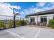 Community basketball court and fenced in for privacy, great for exercise and recreation at 4374 Rhyme St, Kissimmee, FL 34746