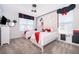 Whimsical Mickey Mouse themed bedroom with two twin beds and creative wall decor at 4374 Rhyme St, Kissimmee, FL 34746