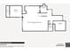 Floor plan showcasing an open-concept kitchen, living and dining area, two bedrooms, a laundry room, and two bathrooms at 4374 Rhyme St, Kissimmee, FL 34746
