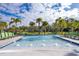 A relaxing lazy river in a community offering refreshing water and lounge chairs for soaking up the sun at 4374 Rhyme St, Kissimmee, FL 34746