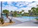 A resort-style pool with a tiki hut and lush landscaping offers a relaxing escape for residents at 4374 Rhyme St, Kissimmee, FL 34746
