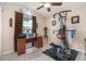 Bright bedroom with a large window, vaulted ceiling, and a Bowflex workout machine at 4620 Eaglet Ln, Kissimmee, FL 34746